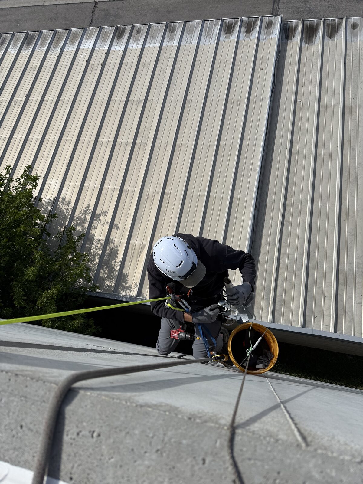 Technician completing upper-story exterior repair work